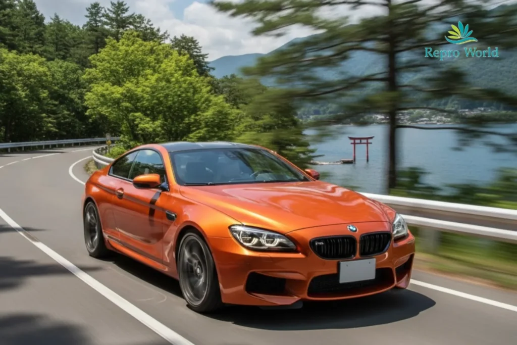 BMW M6クーペが山岳ワインディングロードを高速走行するダイナミックな外観